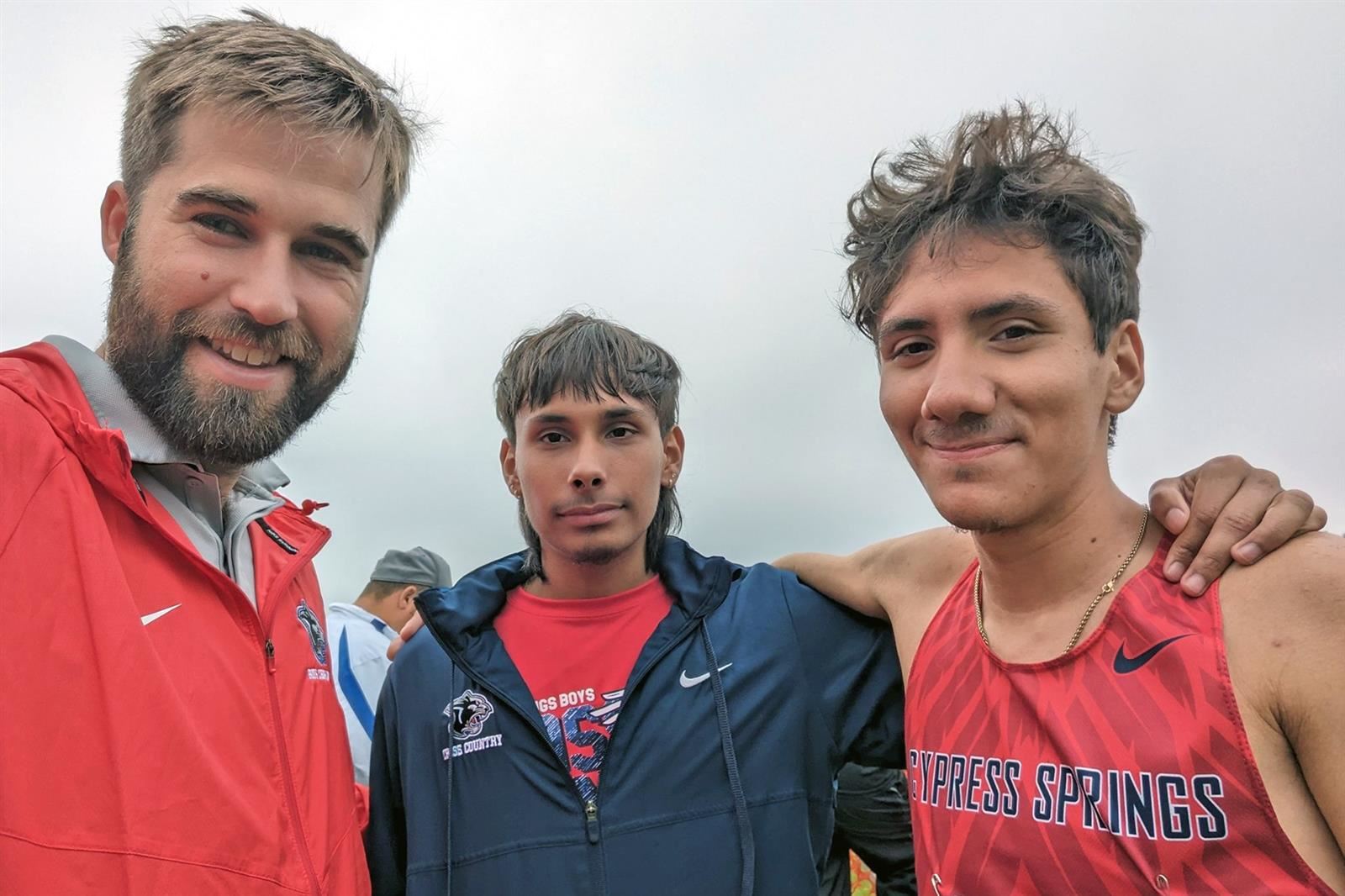 Cy Springs senior Manny Vela, right, placed 11th overall with a time of 15:20.40 at the UIL Cross Country State Championships